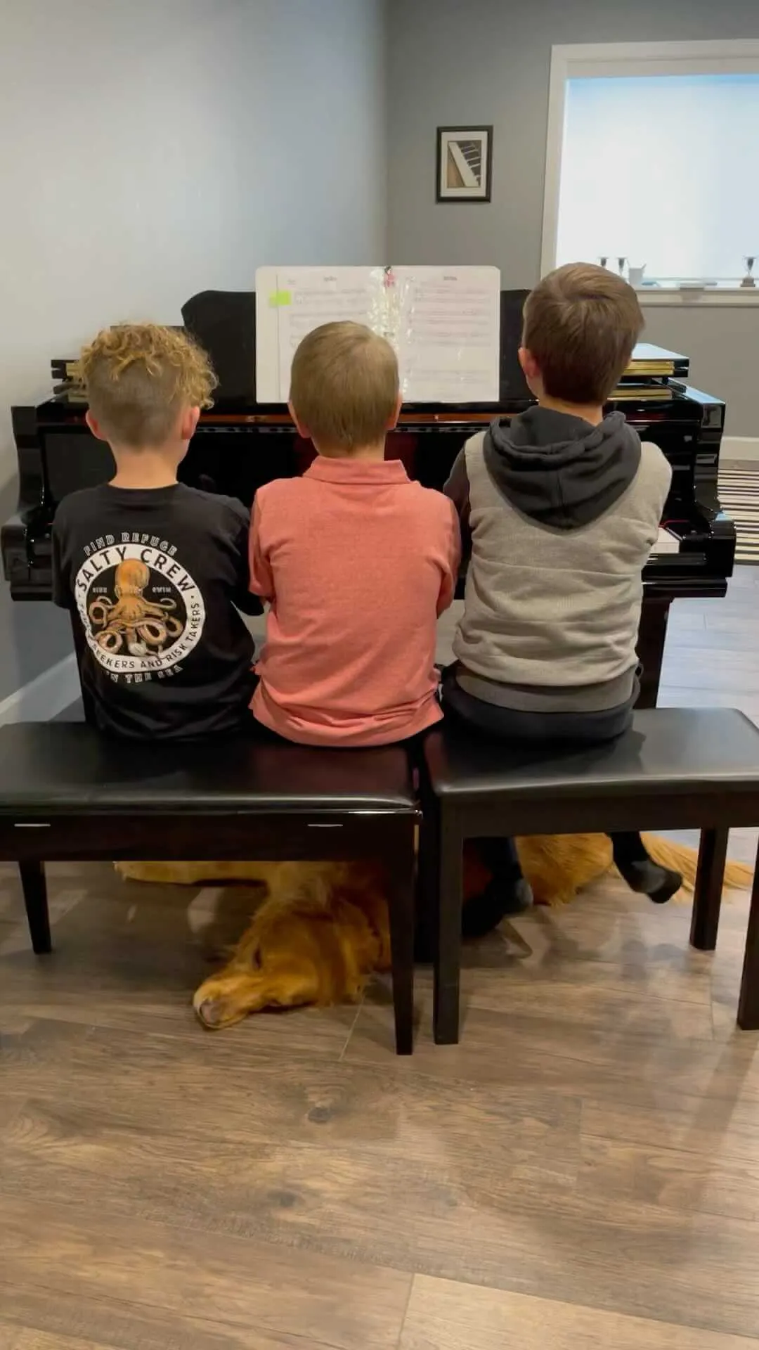 3 young students at piano
